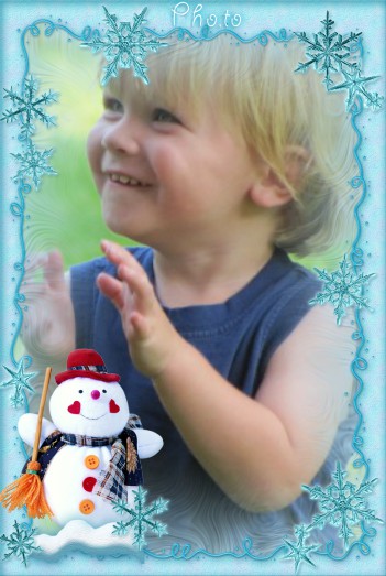 Marco navideño con un muñeco de nieve
